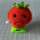 Kävelevä virkattu tomaatti